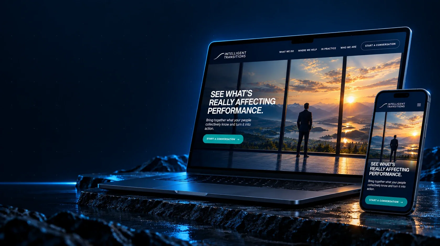 The Intelligent Transitions website on a laptop and a phone: a consultant looking out over a mountain lake at sunrise, beneath the headline 'See what's really affecting performance'.
